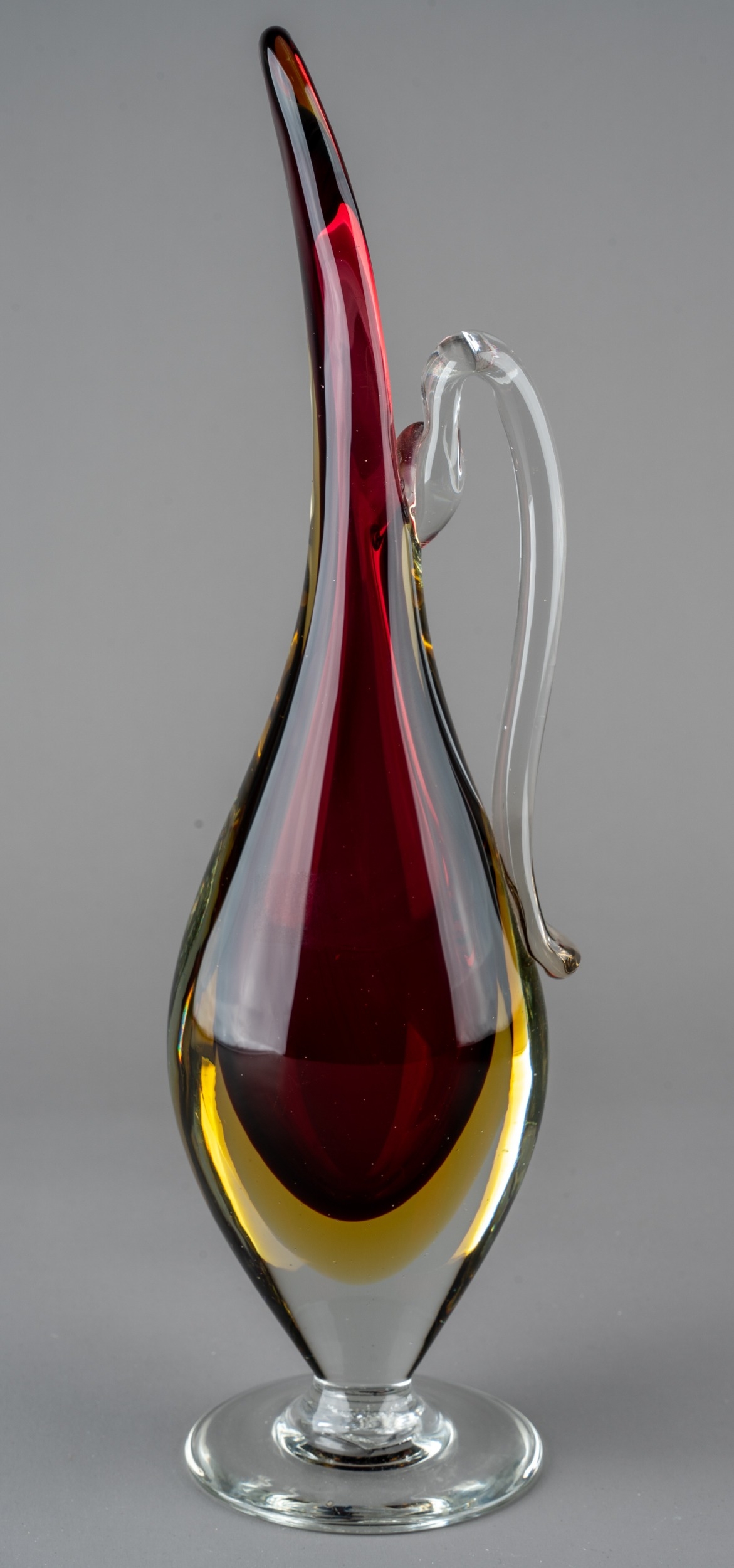 A 20th Century Murano glass purple and amber Sommerso carafe jug in the manner of Flavio Poli,