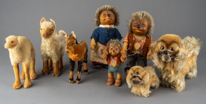 A collection of 8 vintage Steiff stuffed toys to include Micki, Mecki and Mucki Hedgehogs, two dogs,