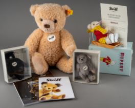 Collection of Steiff to include: Hannes 32cm bear; a boxed Rupert Bear on sleigh ornament and two
