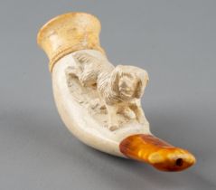 A Meerschaum crouching spaniel pipe, in fitted leather case, approx 8cm long some surface dents, one