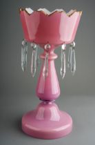 A Victorian pink opaline glass table centre piece, with gilt border and droplets to base of bowl,