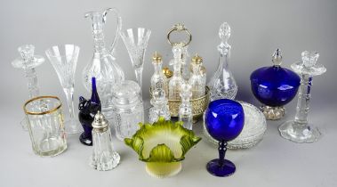 A collection of glassware to include decanters, candlesticks, blue glass brandy glass, cruet set