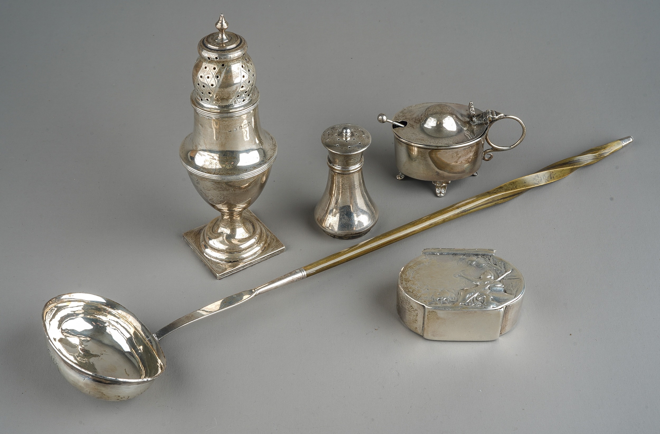 A collection of silver to include: Georgian style baluster caster, hallmarked Birmingham, 1920; an