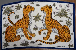 A vintage Hermes beach towel depicting leopards, label to reverse wear commensurate with age and