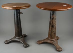 Two Singer stools with cast iron bases, revolving seats (2)