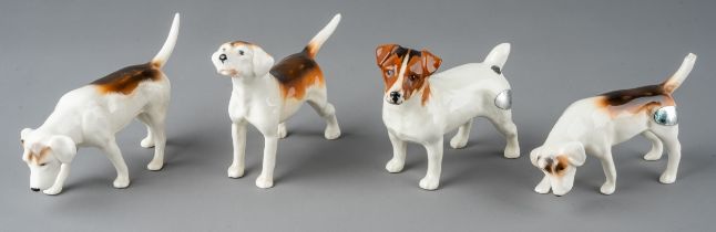 Four Beswick dogs to include three Hounds and a Jack Russell (4) one hound with broken tail tip