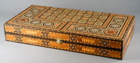 A Continental inlaid backgammon / games board, approx 49 x 25cm