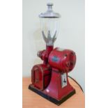 A vintage Hobart coffee grinder, with a red metal casing, model no. E455, 78cm high (some damage)