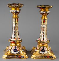 A pair of Royal Crown Derby Imari 1128 large candlesticks, red backstamps, date code for 1979, 26.