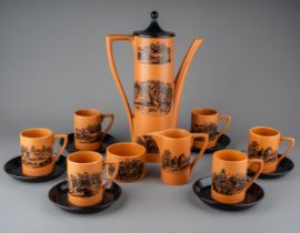 A set of six Portmeirion "Sporting Scenes after Thomas Beswick" coffee cups, saucers, milk jug and