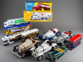 A collection of model vehicles, including Burago, Corgi, etc, cars, buses, transporters