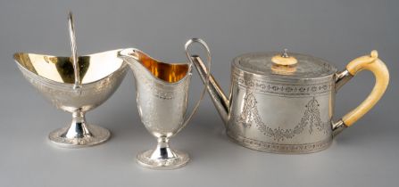 A Victorian hallmarked sterling silver 3-piece Bachelor's tea set in the Georgian style, the jug and