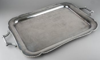 A late 19th Century EPNS rectangular two handled tray with egg-and-dart border, stamped to