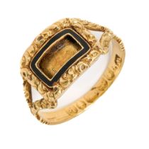 A George III 18ct gold and enamel memorial ring, the central cartouche with black enamel border,