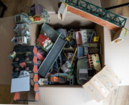 A large collection of assorted model railway kit buildings to include: platforms, bridges, houses,