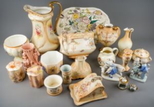 A collection of ceramics to include: Staffordshire pink lustre spill vase moulded with seated