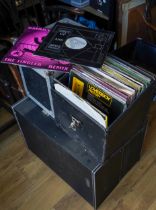 Two large black cases, together with two small cases of LPs