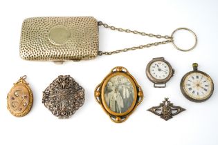 A Swiss 800 silver ladies fob watch; a silver wristwatch case (no strap); a silver brooch; a gilt