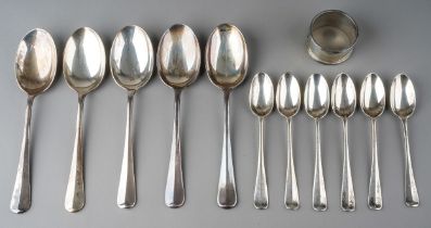 A collection of silver to include: five Modern silver Hanoverian table spoons with six matching