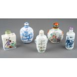 A collection of Chinese snuff bottles, including an enameled bottle decorated with dragons and