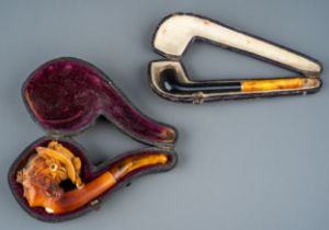 A late 19th/early 20th century Meerschaum pipe, carved as a profile of a lady wearing a bonnet,