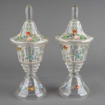 A pair of late 19th Century Venetian glass jars and covers, enameled with colourful flowers, knop