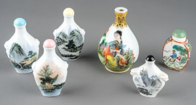 A collection of Chinese porcelain snuff bottles, including three bottles decorated with cranes,