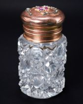 A 9ct rose gold and cut glass scent bottle, the hinged cover set with rose cut diamonds and cabochon
