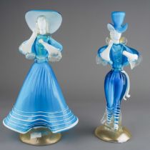A pair of Murano figures of male and female dancers, blue iridescent glass with gold powders, approx