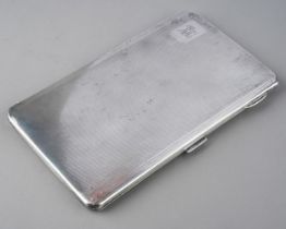 A George V silver cigarette case, engine turned engraved with initials, hallmarked by W Neale Ltd,