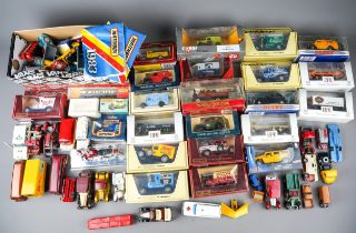 A collection of boxed and loose die cast models of cars, vans, trucks, makers to include: Dinky