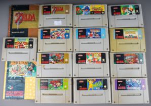 An assortment of twelve loose Super Nintendo (SNES) cartridges, games to include: The Legend of