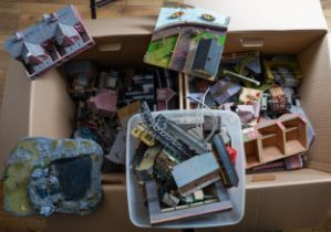 Two boxes of assorted model railway kit buildings to include: houses, factories, stations,