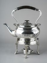 A late 19th Century silver plated tea kettle, burner and stand, ebonised handle and finial,