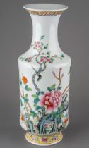 A Chinese porcelain Famille rose vase, hand painted with flowers and birds. Painted seal reign