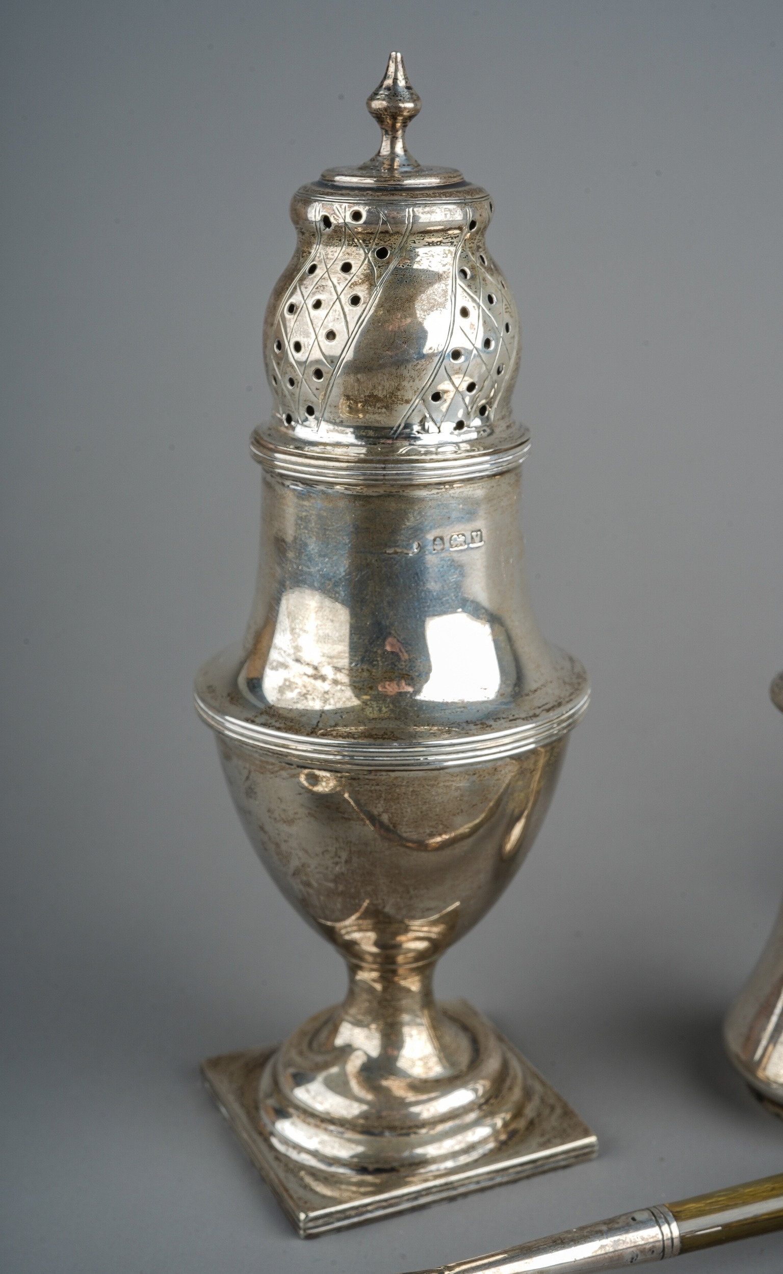 A collection of silver to include: Georgian style baluster caster, hallmarked Birmingham, 1920; an - Image 2 of 6
