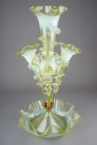 A large Victorian clear and opaline ( uranium) glass epergne, the bowl with wavy rim, four trumpet