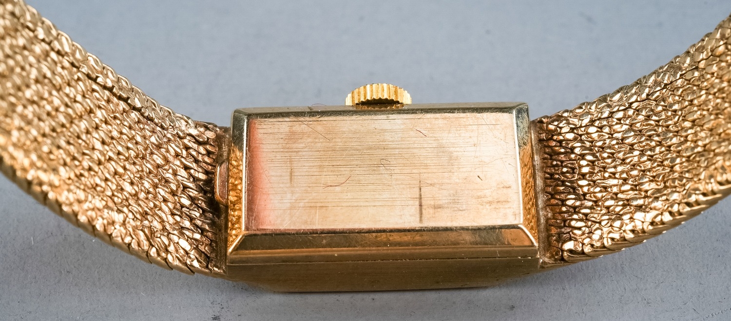 A ladies 18ct yellow gold Omega wristwatch, rectangular dial with baton indicators, integral - Image 5 of 7