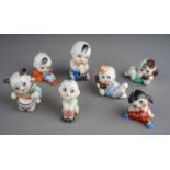 Collection of 7 baby porcelain figurines, possibly by Cmielow factory. Red number stamps to base.