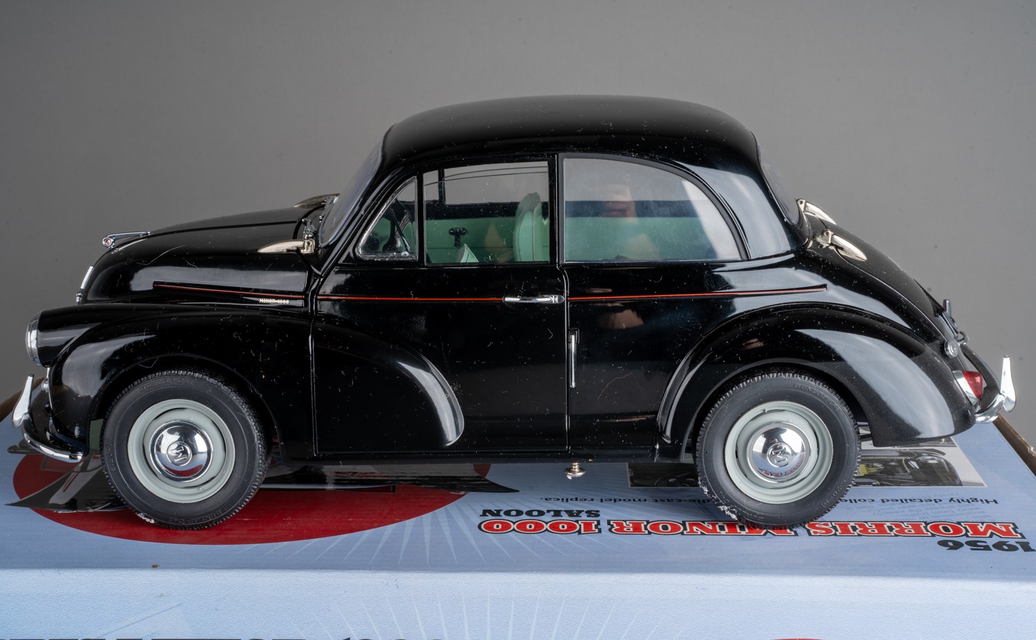 Toys: a boxed Sun Star die-cast 1:12 scale replica model of a 1956 Morris Minor 1000, boxed in