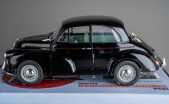 Toys: a boxed Sun Star die-cast 1:12 scale replica model of a 1956 Morris Minor 1000, boxed in