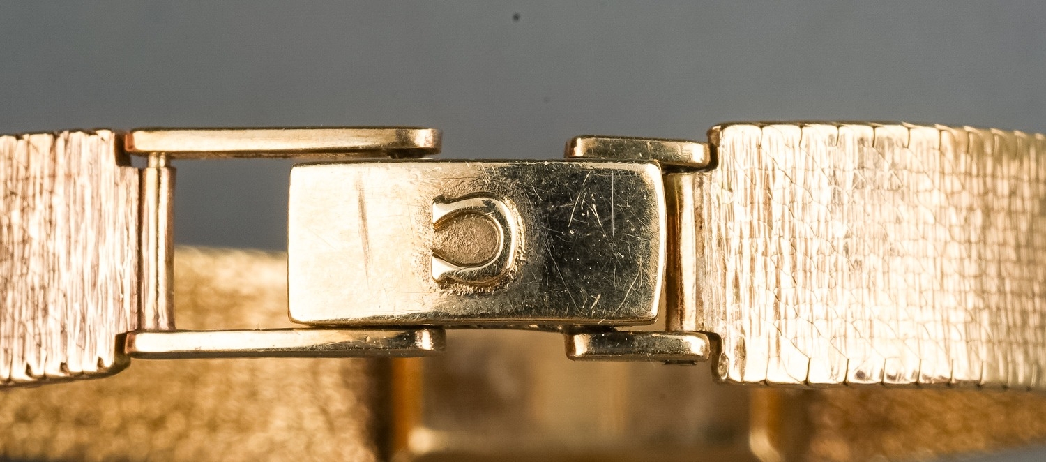 A ladies 18ct yellow gold Omega wristwatch, rectangular dial with baton indicators, integral - Image 6 of 7