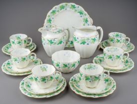 An early 20th Century Royal Crown Derby Ivy Leaf pattern six piece tea service to include: cups,