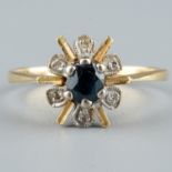 An 18ct gold sapphire and diamond ring, size O1/2, 3.4g Good condition, wear commensurate with age