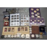 Collection of coins to include some silver and half silver coinage in albums, proof sets, 1797