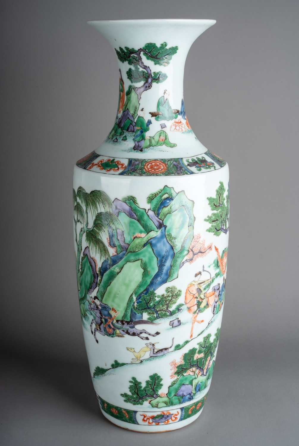 Large antique Chinese Famille Vert porcelain vase finely decorated with figures on horses and camels