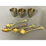 A set of four Russian 916 standard silver gilt ornate coffee spoons, the bowls stamped, gross weight