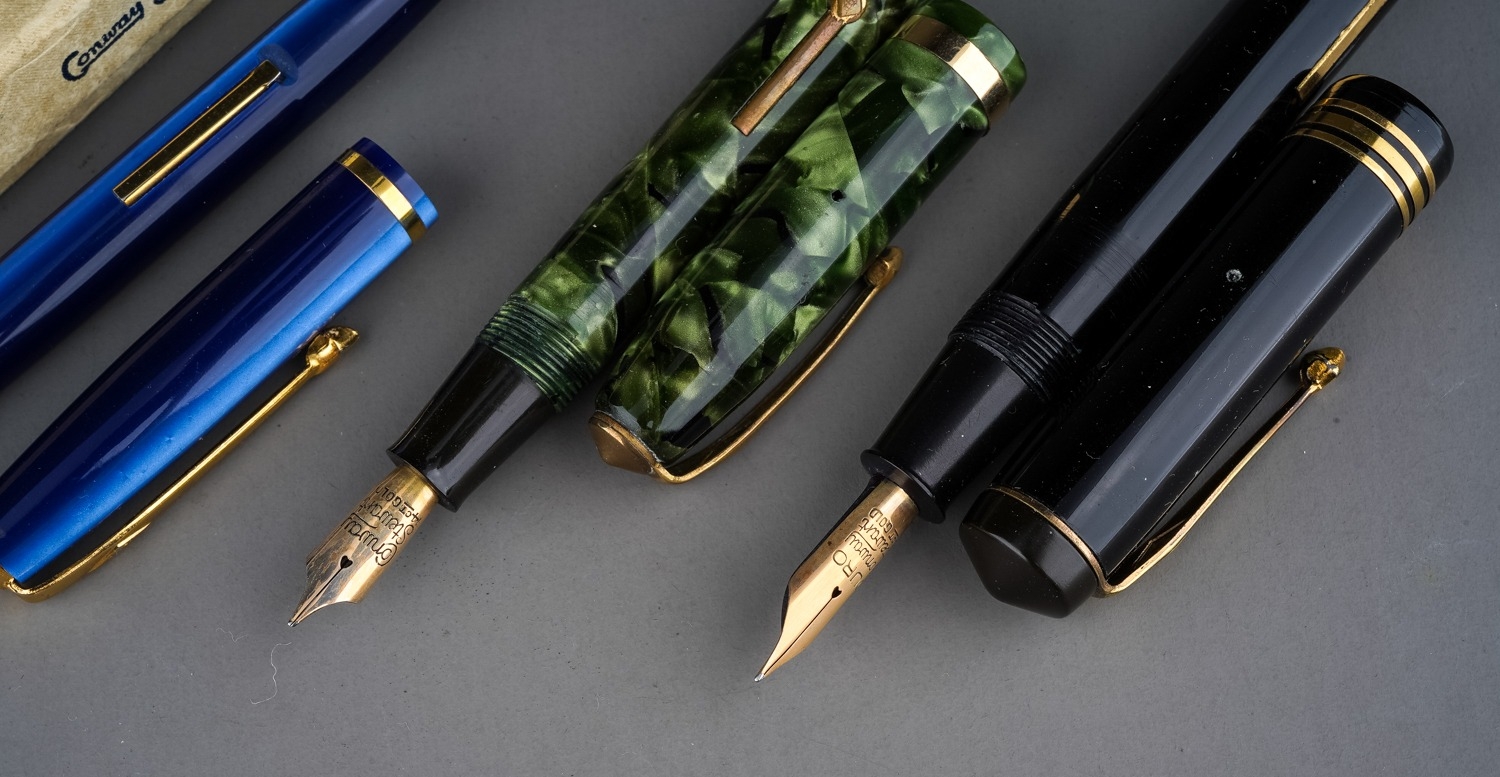 A collection of five early 20th Century Conway Stewart fountain pens to include: boxed blue and - Image 5 of 5
