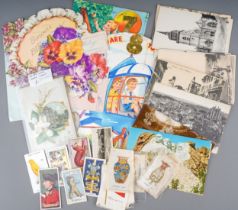 Assorted early 20th Century topographical and portrait postcards together with vintage Christmas