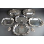 Fine set of four matching Rococo design silver plated entrée dishes complete with lids and